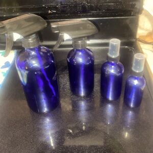Blue glass spray bottles